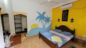 Malika's Yellow House